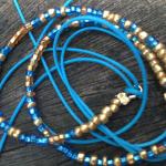 Bracelet lien perles bleues et Or