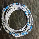 Bracelet lien perles blanches et grises